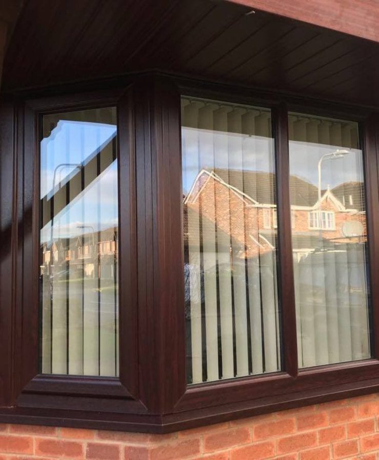 Modern bay UPVC window Installation with roof in Liverpool by Allerton Windows.