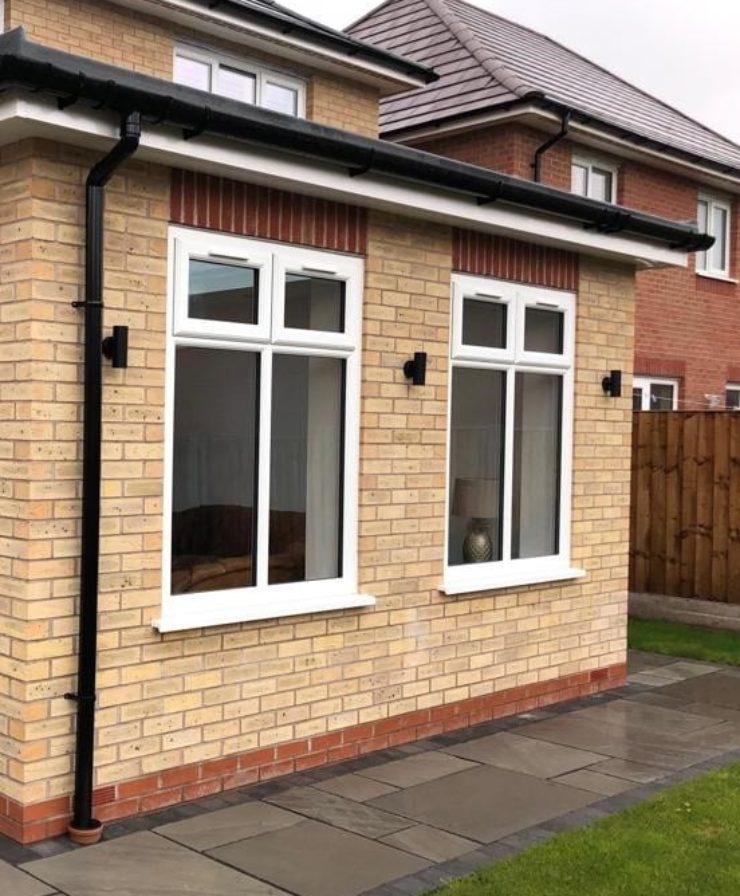 Single storey home extension with UPVC tilted casement windows in Liverpool by Allerton Windows.
