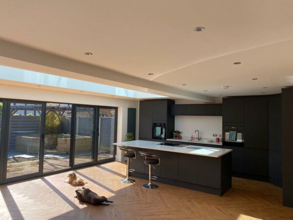After picture of kitchen conservatory extension at Penrose Gardens by Allerton Windows.