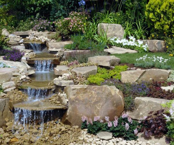 Trickling water feature for blog about front garden ideas.